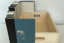 13 a crate with faux books attached to it can hide any electronics you want to hide, and will do it with elegance