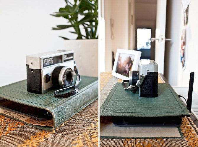 a wi-fi router hidden inside a vintage book cover is a nice idea for any space, it's elegant and very chic