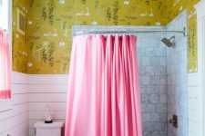 a printed wallpaper looks great in this bathroom