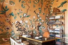 a stylish home office with a gorgeous wallpaper