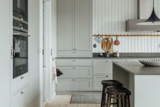 a cute neutral gray kitchen in a modern country style