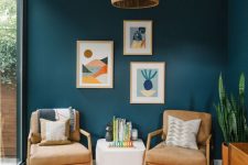 17 cool mid-century modern chairs and a coffee table, a bright gallery wall and printed textiles are lovely for a millennial living room