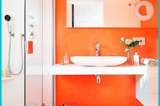 a contemporary bathroom design in a mix of orange and white tones