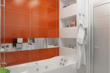 a minimalist bathroom with large scale tiles, an orange accent wall and all white everything is a very bold idea for a contemporary home