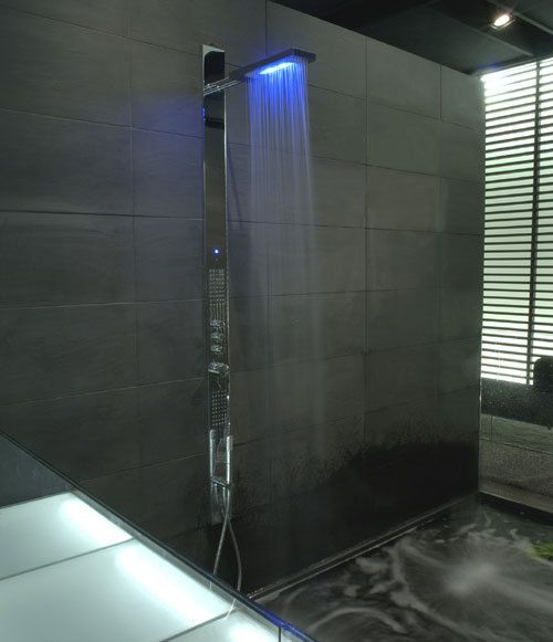 an ultra-modern shower panel with LED lights is a cool idea for a millennial bathroom and will make a person relax more