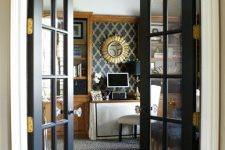 elegant black French doors add chic to the space and make the rooms more lovely and bold and look very lightweight at the same time