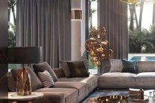18 an exquisite taupe living room with taupe sofas and curtains, a brown rug, a glass and metal coffee table and a gorgeous chandelier