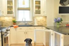 a cozy neutral kitchen with a farmhouse feel, a faux stone backsplash and a dog kennel with a mattress that is enough for two pets