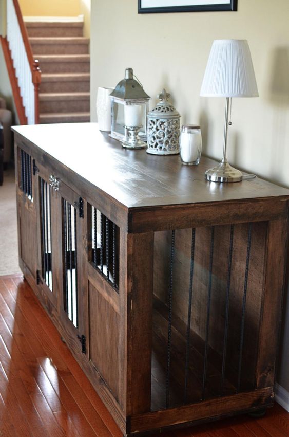 a dark-stained rustic dog kennel doubles as a console table is a lovely idea for a truly rustic room