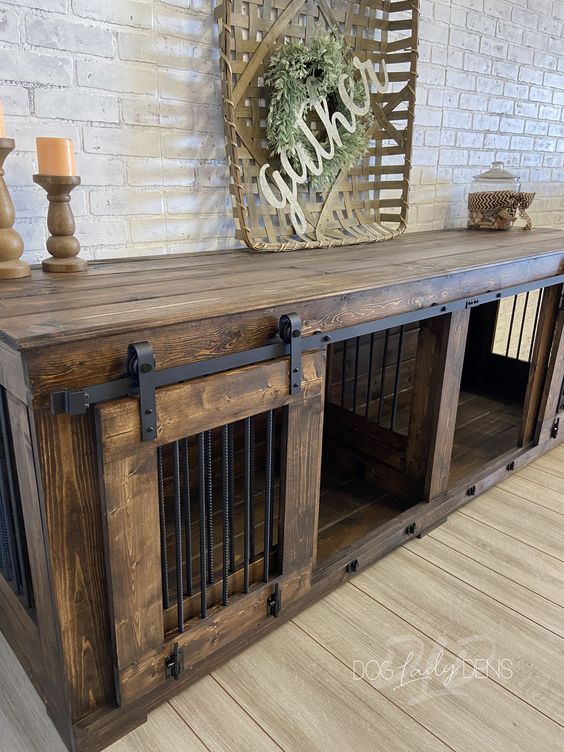 a rich stained two dog kennel with a sliding door doubles as a console table is a very cool idea for an industrial space