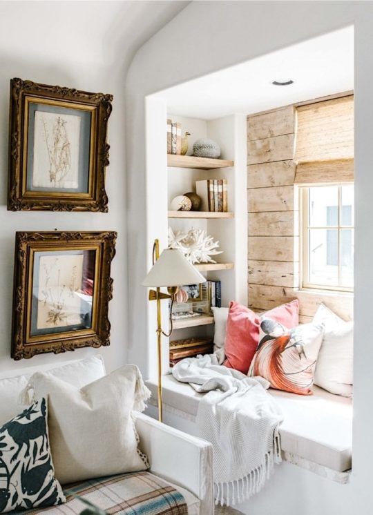 a small windowsill sseat, built-in shelves on each side of the window and bright pillows and a blanket is a lovely space to read and not only