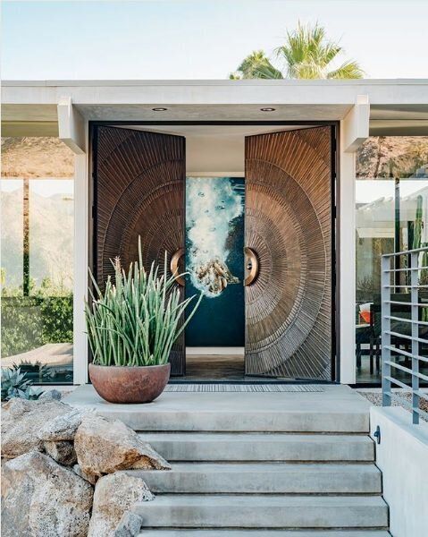 fantastic oversized metal front doors with a pattern is a gorgeous solution for a mid-century modern or modern house