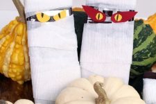 spooky Halloween block mummies is a cool idea to DIY for Halloween and are fun for a kids’ party