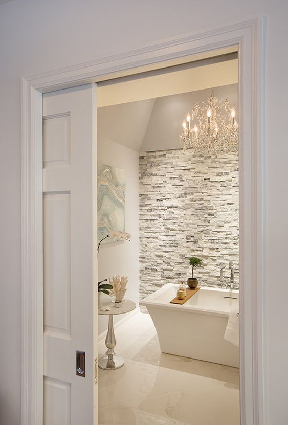 white paned pocket doors are ideal for a modern farmhouse home, they don't take room and look rather lightweight