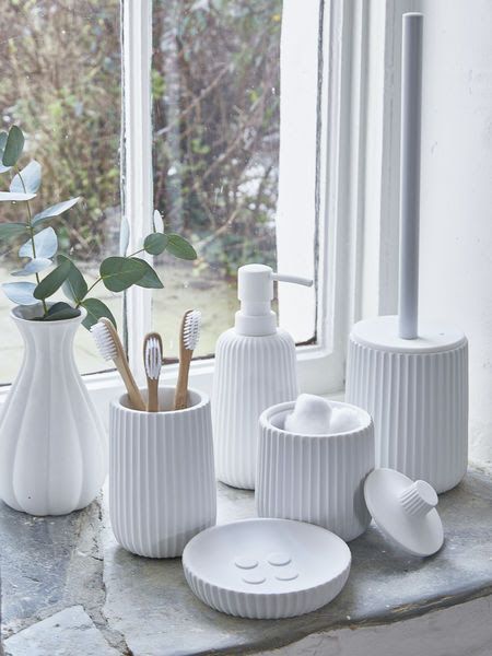 a lovely and simple white ribbed set for bathroom essentials is a very cool idea for your space