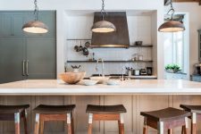 a rustic kitchen with light-stained cabinetry, open shelving, built-in storage furniture, rich-stained stools and a reclaimed wood ceiling