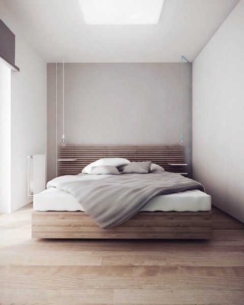 a small minimalist bedroom with a stained floating bed with a planked headboard and floating nightstands, pendant lamps and a skylight