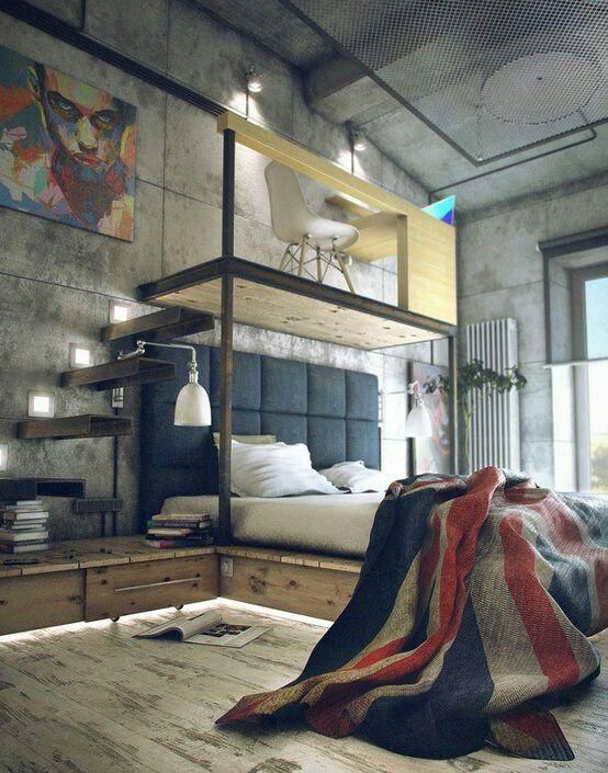 an industrial bedroom with concrete walls and a shabby chic floor, a floating bed with a built-in nightstand and a platform on top