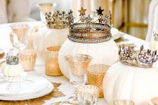 05 a fabulous glam Thanksgiving tablescape with white pumpkins with crowns, gold chargers and candleholders, mini pumpkins with crowns