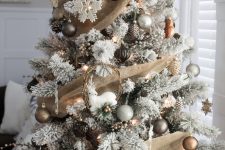 07 a beautiful winter Christmas tree with burlap ribbons, silver, grey and gold ornaments, deer, white snowflakes and lights