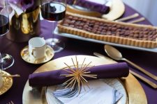 12 a purple and gold glam Thanksgiving tablescape with purple linens and calla lilies, gold touches and refined modern glasses