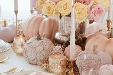 18 a super glam Thanksgiving table setting with blush and light pink pumpkins, copper candleholders and cutlery, tall and thin candles