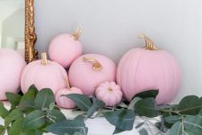cute thanksgiving mantel decor idea with pink pumpkins