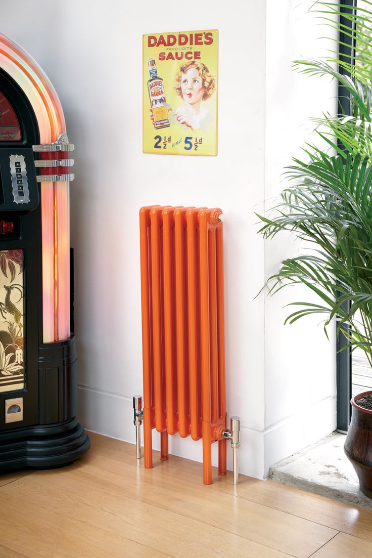 a bold orange radiator is a fresh and cool decor solution for your interior, not just a functional piece