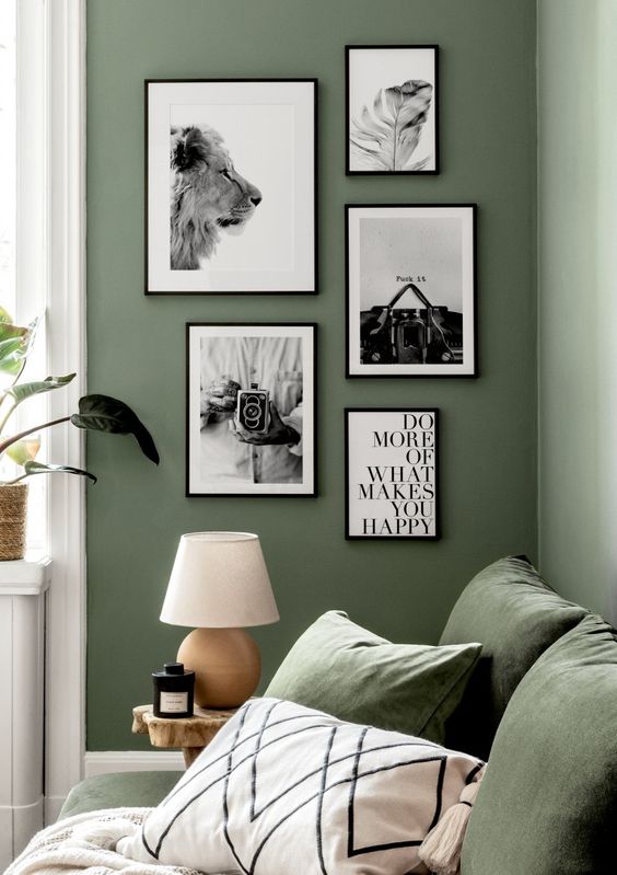 a chic mini free form black and white gallery wall with a bit of white matting and black frames is a cool idea for a modern space