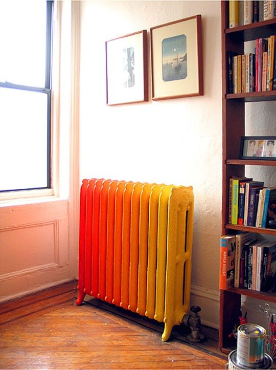 a super bold ombre yellow to red radiator is a fantatic way to add color to the space and make it stand out a lot