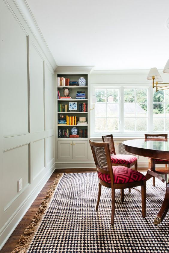 molding on the walls and crown molding that perfectly matches in color and makes the space look neater and more eye-catching