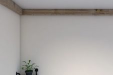 weathered rustic crown molding is a creative way to add a cozy feel to the space highlighting its style at the same time