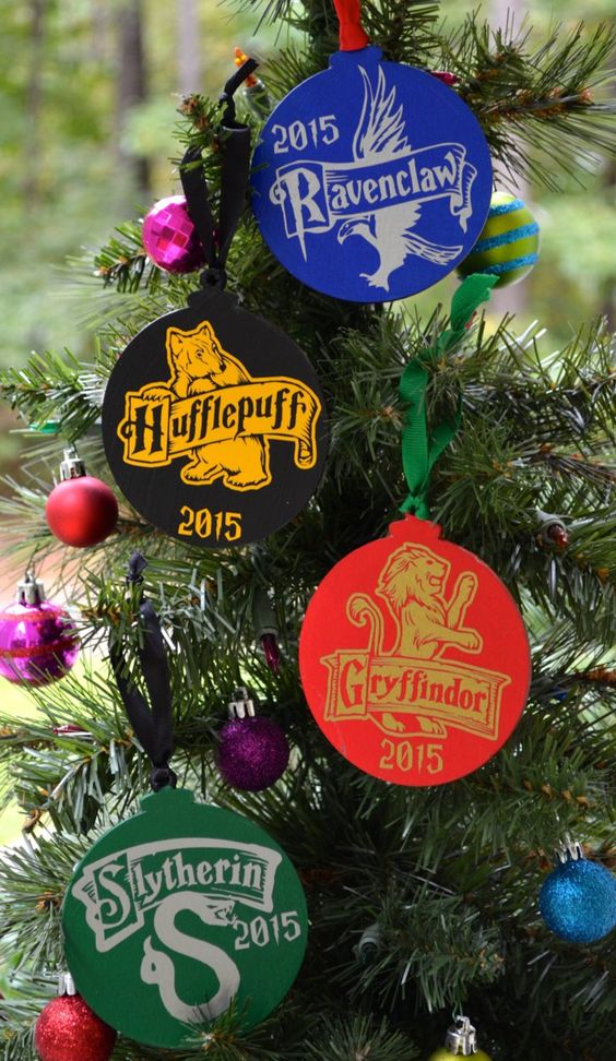 a Christmas tree decorated with bright faculty cardboard ornaments and colorful baubles is a fun and cool idea