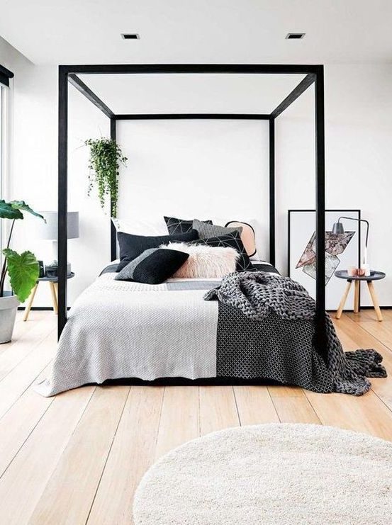 a black framed bed is a nice modern touch to your bedroom, and if you don't have it - just paint the existing one