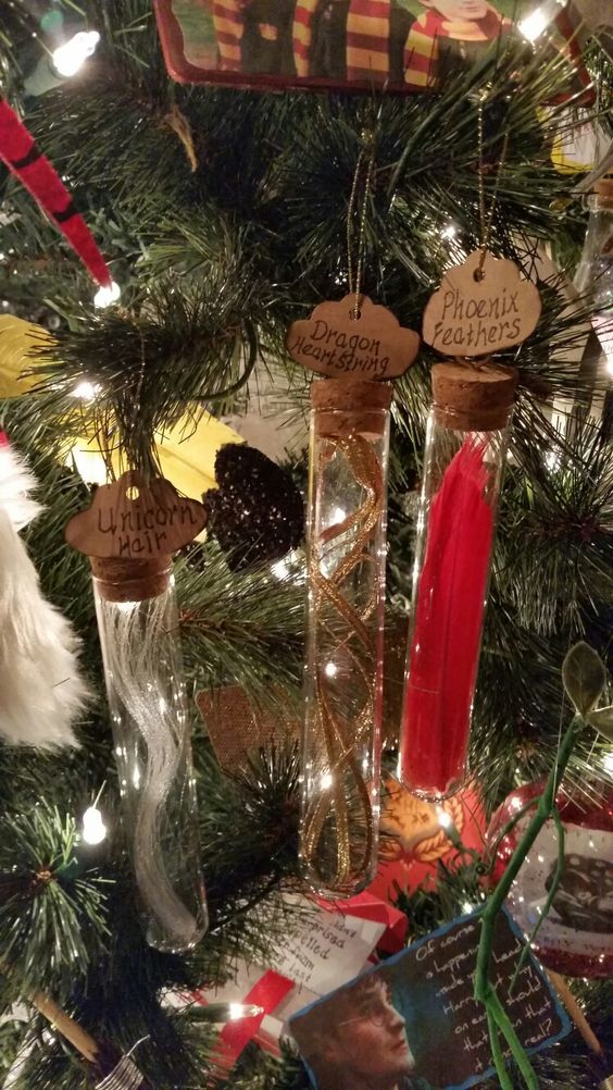 a Christmas tree decorated with test tubes holding various magical ingredients from Harry Potter books