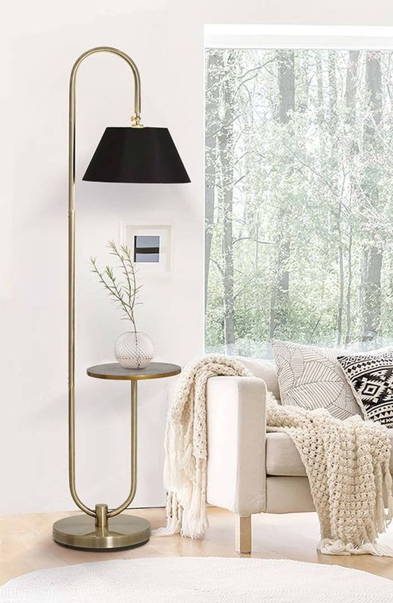 a fantastic tall floor lamp with an additional side table is a lovely functional furniture piece that will make an accent