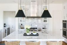 20 just a couple of black pendant lamps and wicker stools on black legs make the neutral refined kitchen look modern