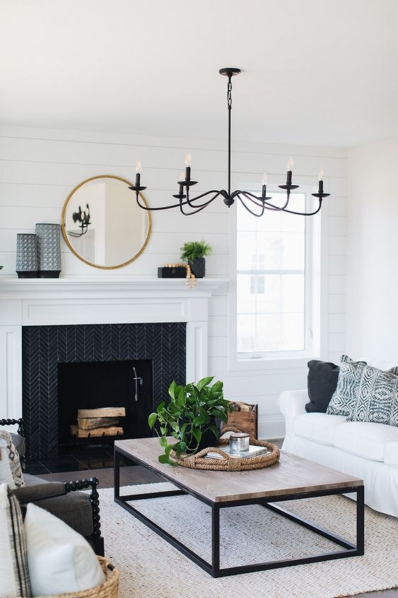 this beautiful vintage-inspired black chandelier adds charm and chic to the space and finishes off the look