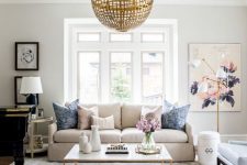 23 a large neutral blue and whire printed rug is a delicate and chic touch to this modern living room is amazing