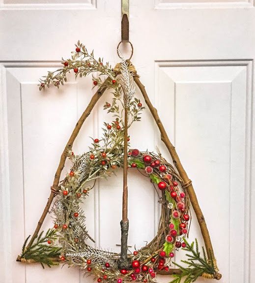 a pretty and creative Deathly Hallows Christmas wreath is agorgeous solution for Harry Potter fans