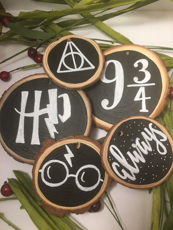 chalkboard wood slice Christmas ornaments are a cool and creative idea for a Harry Potter inspired Christmas party