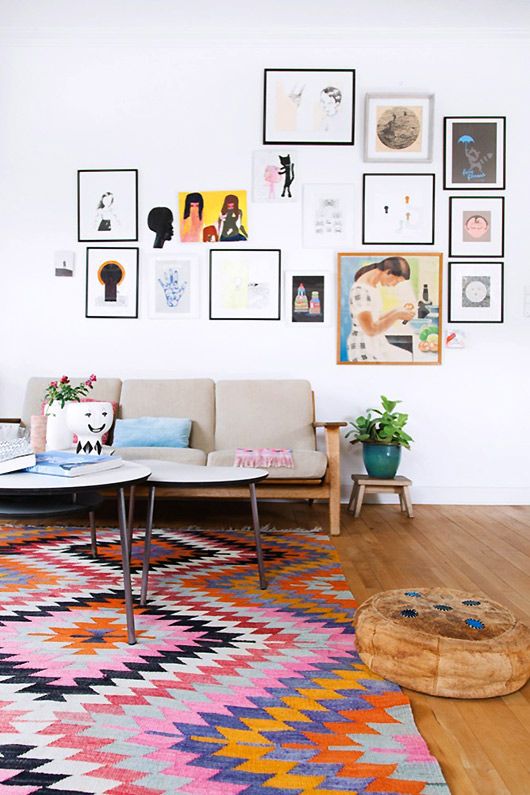 a bold and colorful printed rug will hide all the imperfections of your floor or the floor cover that you don't like