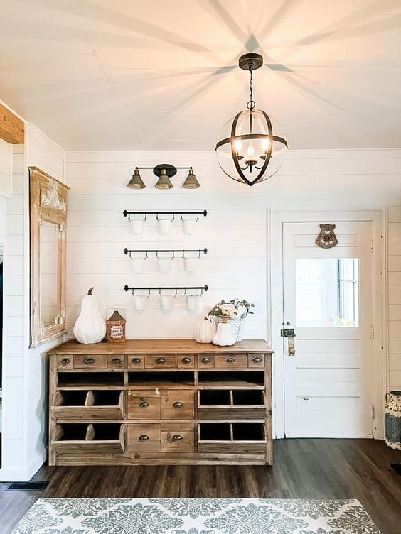 a cabinet made of reclaimed wood is an eco-friendly way to repurpose old wood and a lovely farmhouse touch to the space