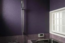 a dramatic purple bathroom design