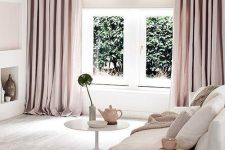 a semi sheer neutral shade plus blush draperies are amazing to soften the space and give it a lovely feminine touch to it