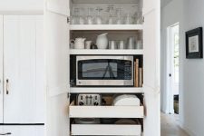 24 slide put pantry kitchen drawers holding appliances, tableware, glasses and other stuff is a great idea for a modern kitchen