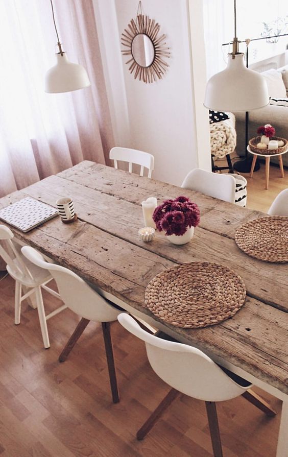 a beautiful dining table of wood and aged wood is a beautiful solution for any space if you want to add a touch of farmhouse aesthetic to it