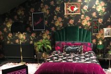 a moody attic bedroom design with a floral wallpaper