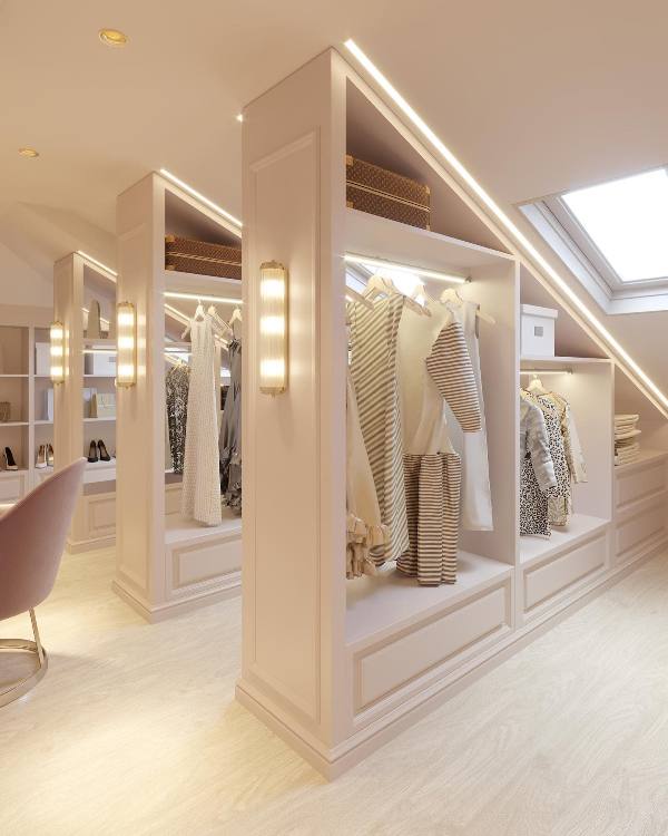 a stylish neutral attic turned into a walk-in closet with open shelving and lights is a gorgeous solution to use your attic space