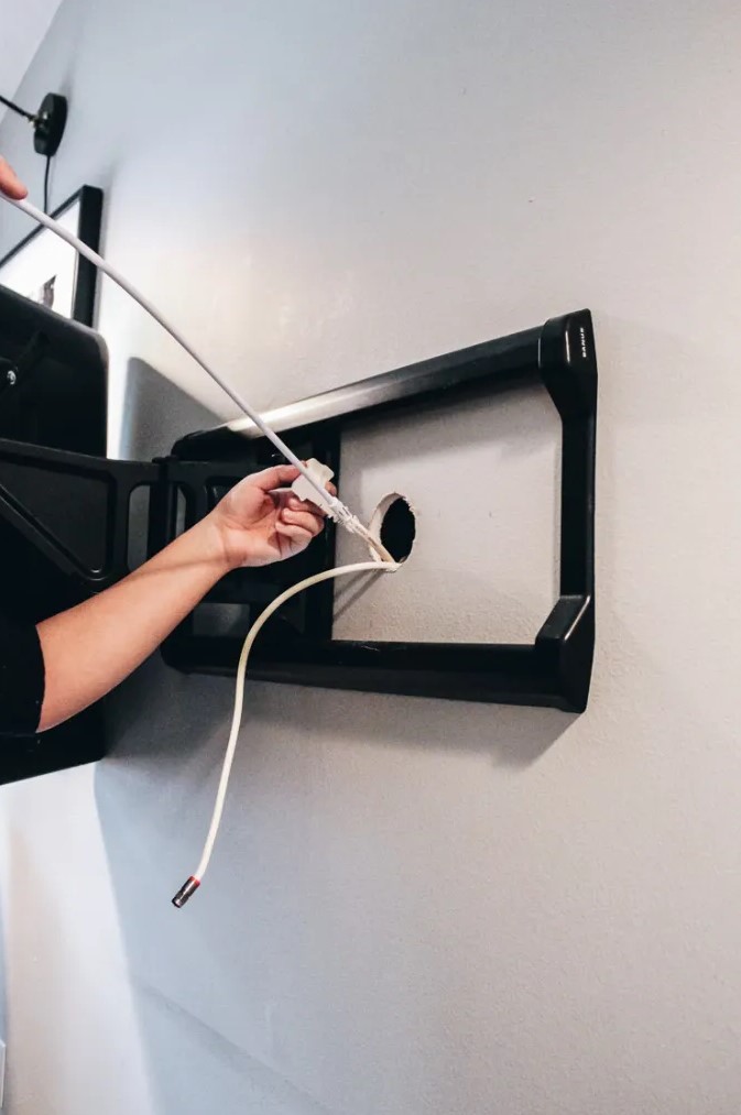 place all the cords inside the wall and make the TV look sleek and seamless